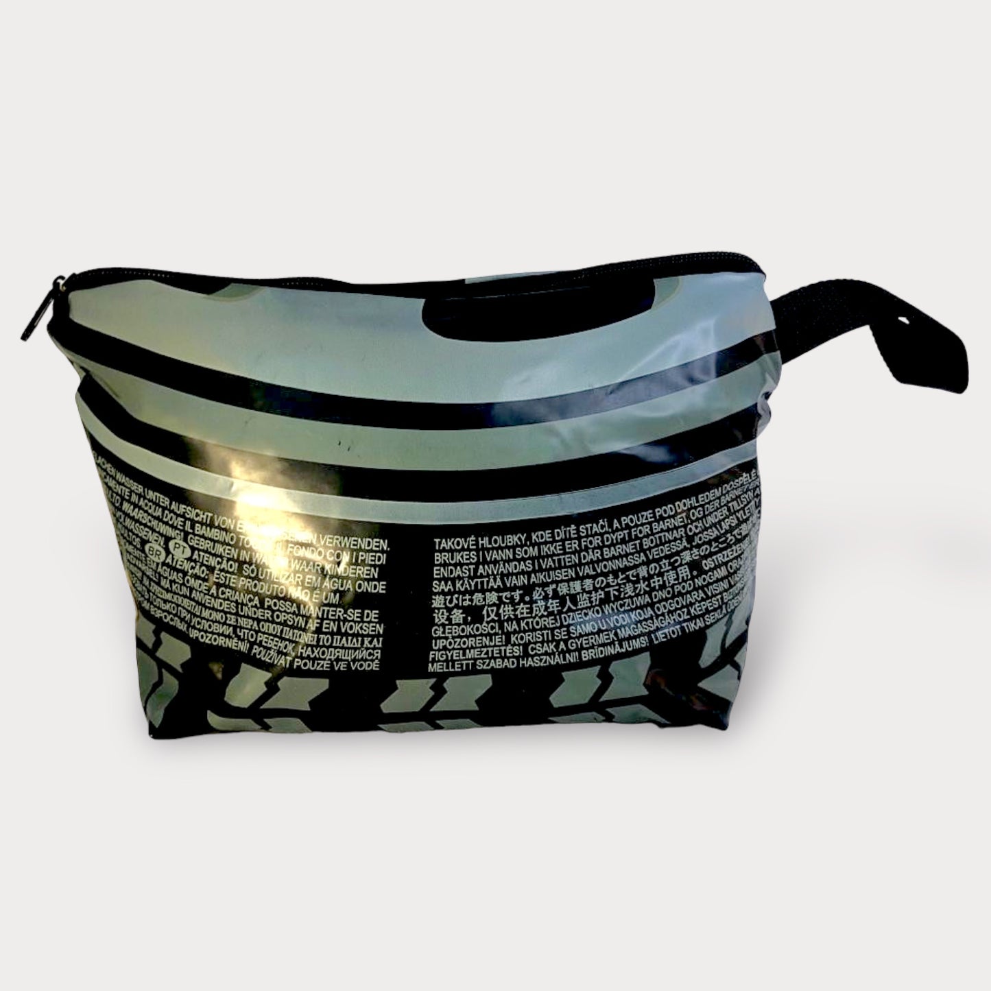 Overnight Bag . Tires. Pool Toy